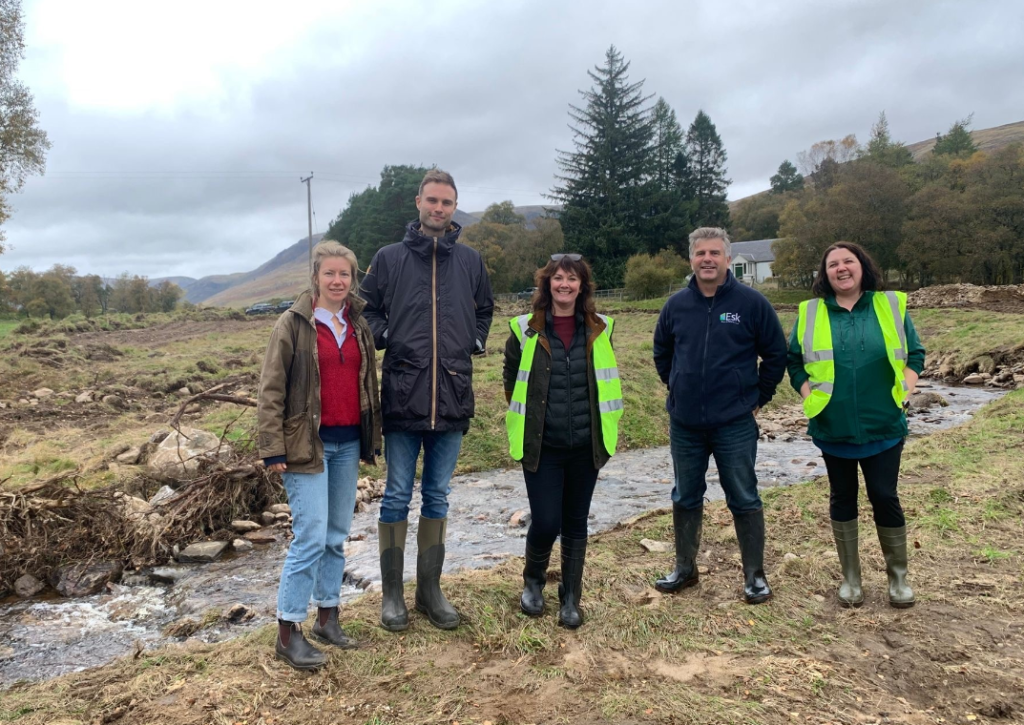 5 people standing outside next to the River South Esk